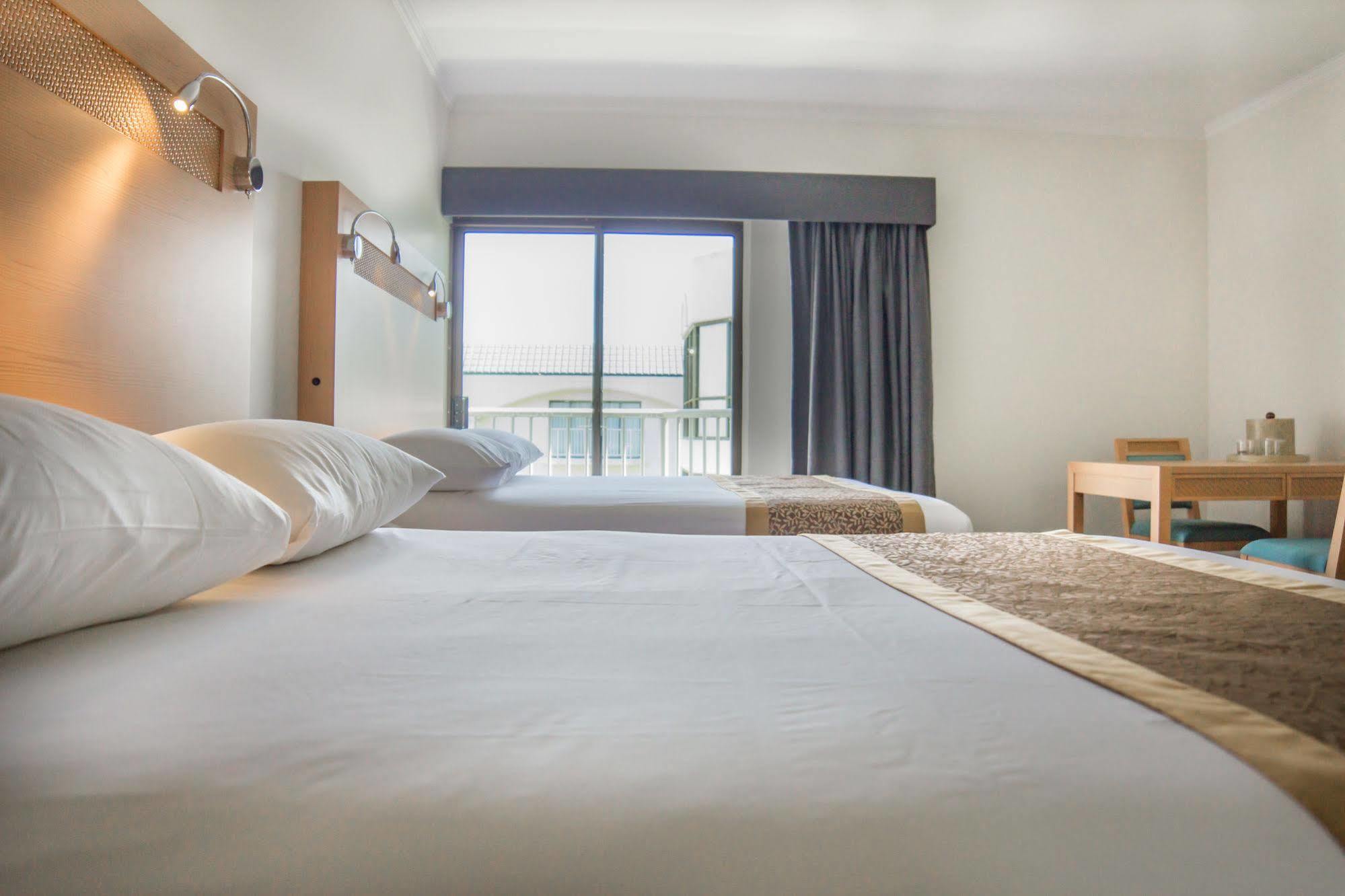 Oceanview Hotel And Residences 塔穆宁 外观 照片